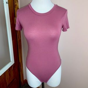 Purple short sleeved bodysuit from Marci